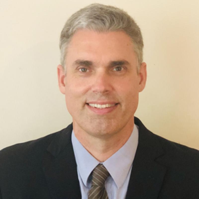 Dr. Alec Holcombe
