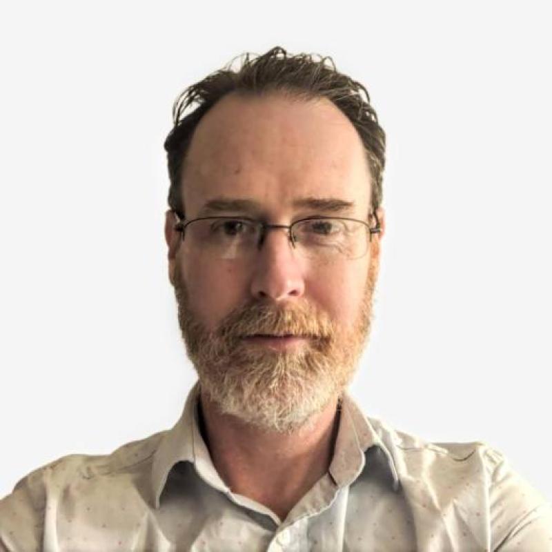 A headshot of Andy Ray