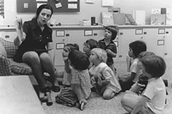 Jean Harlan reading to children