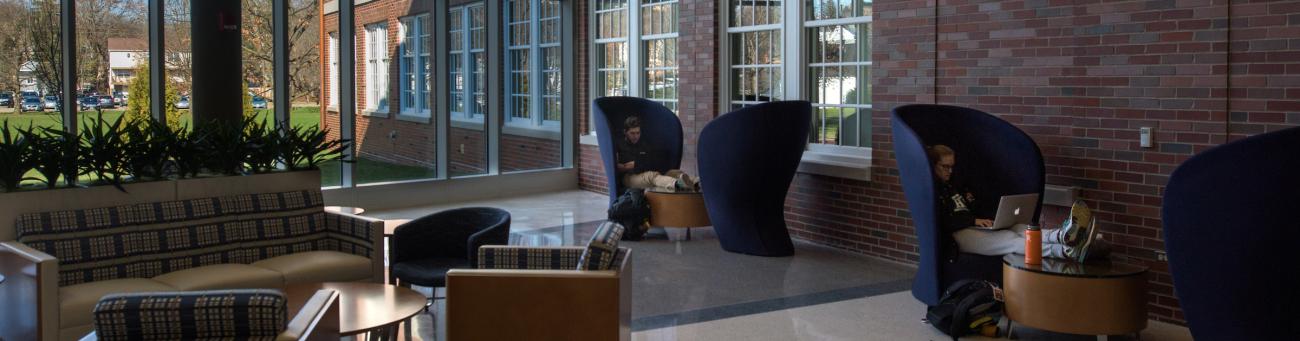 Students sit and study in a Patton building