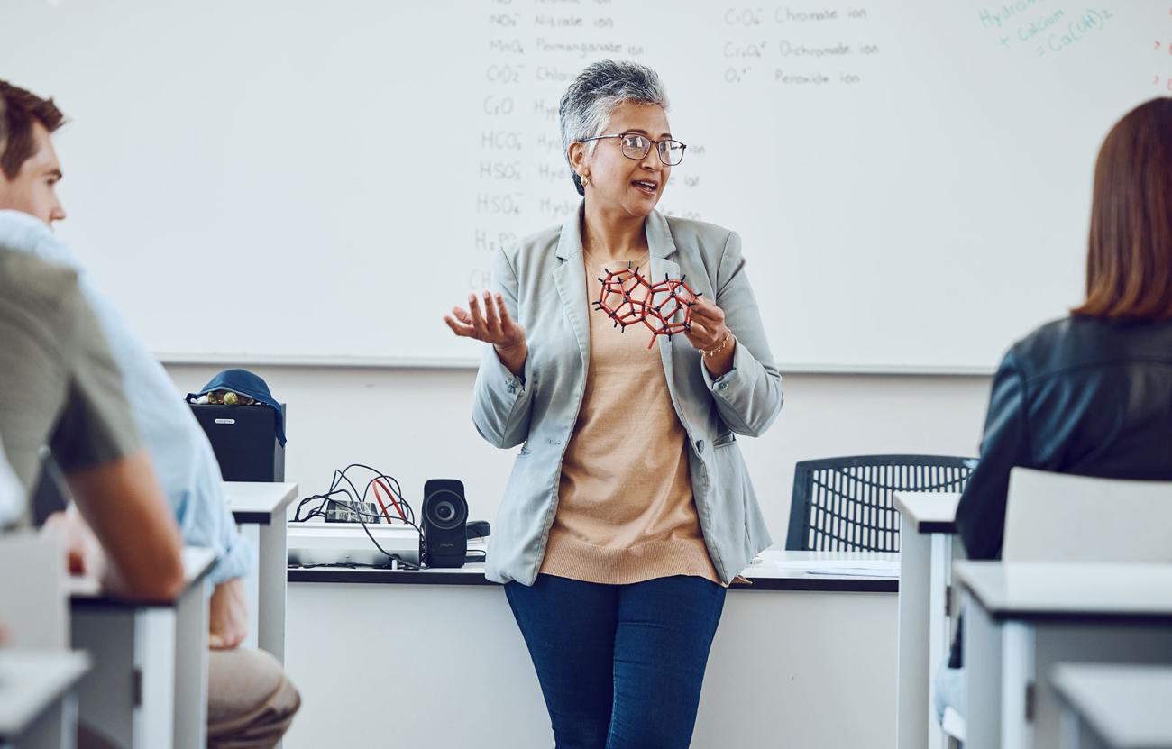 Science professor gives a lecture during class