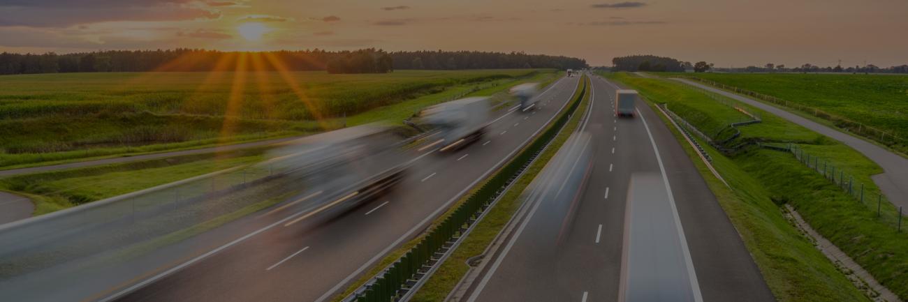Illustration of a rural highway and setting sun