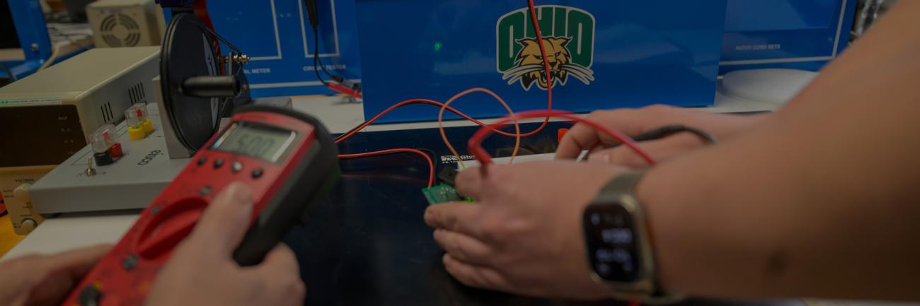 Ohio University students using an automation controller