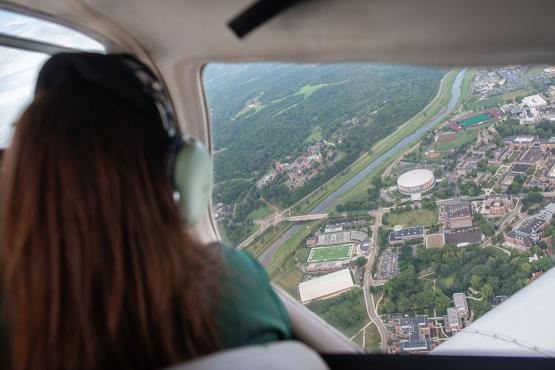 Student flying an airplane over Athens, Ohio