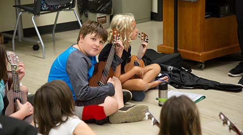 Students play instruments at Summer Music Week