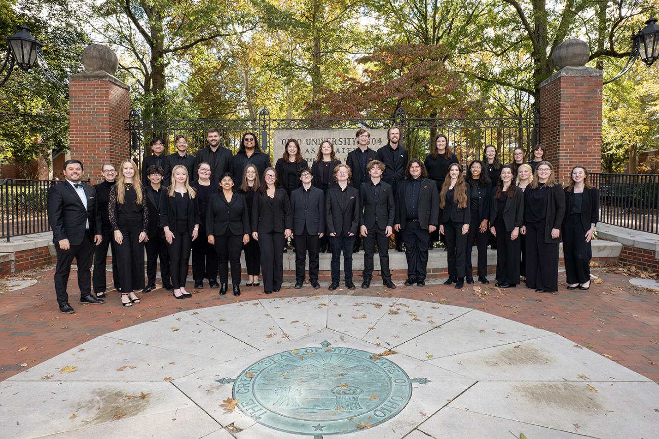 Group shot of choir on college green