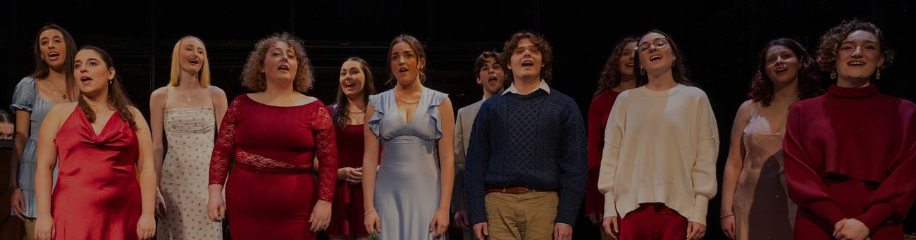A group of students perform in a play.