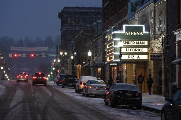 Snow-covered Court Street in Uptown Athens, home to the Athena Cinema.