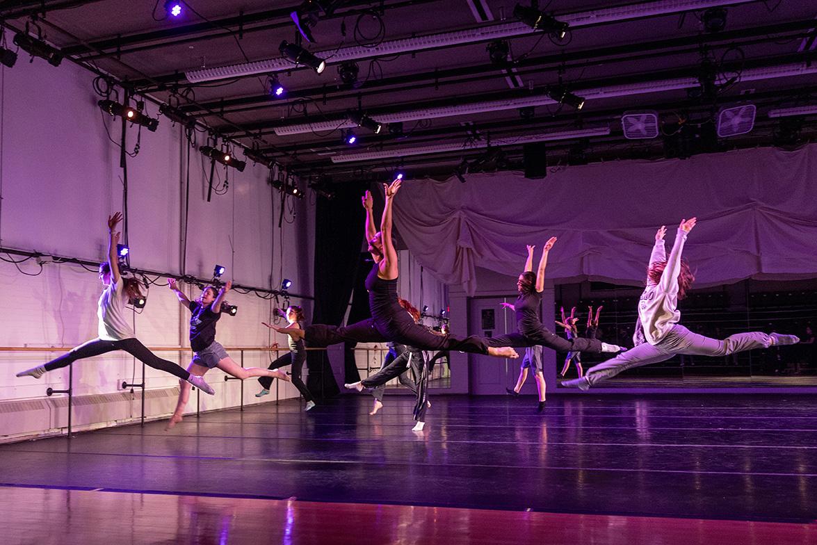 Dancers in studio performance space.