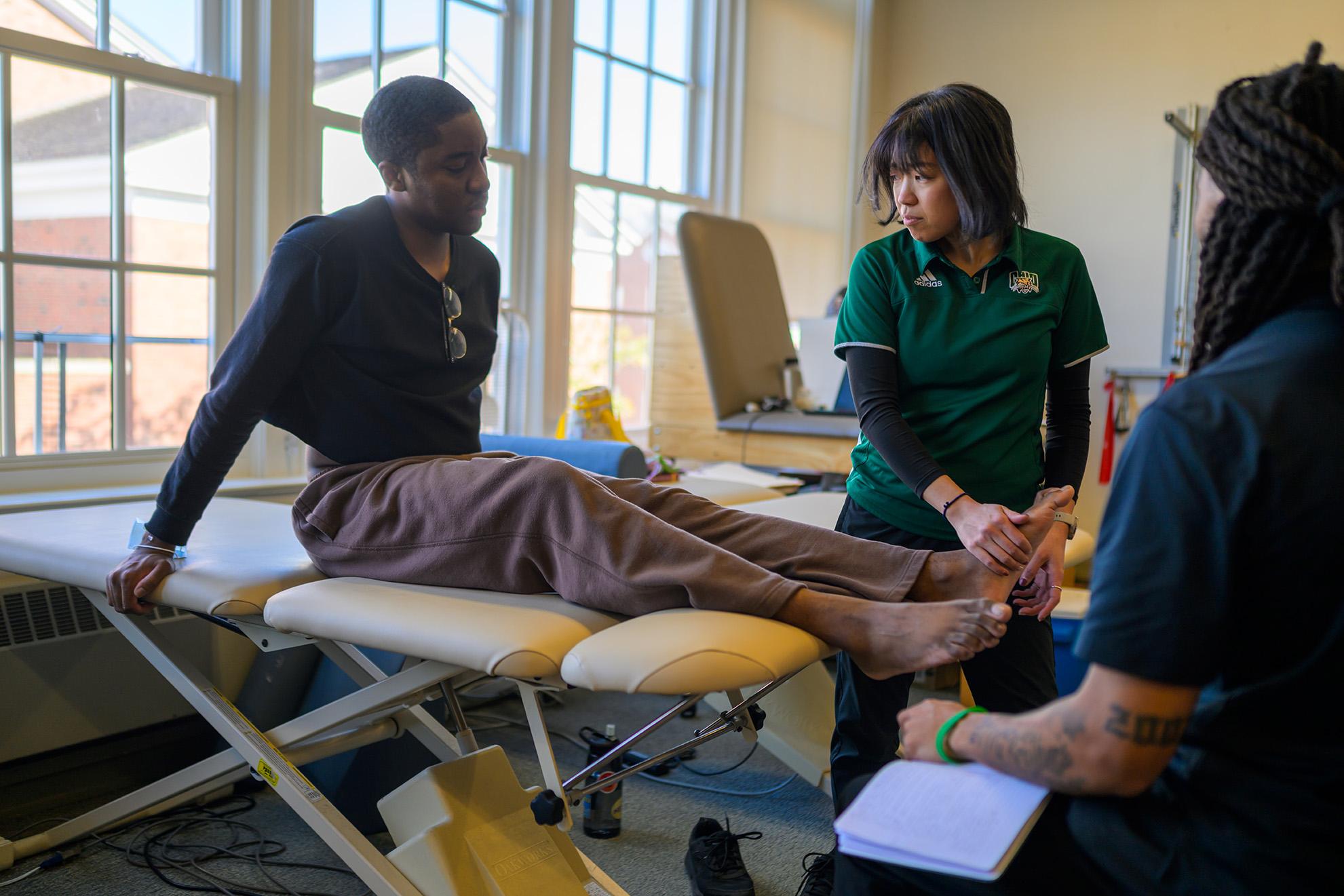 Doctor and patient in clinical setting. 