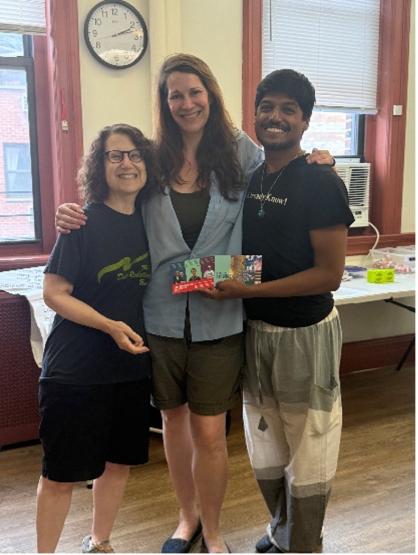 Carla Briscoe posing with two other people at her internship