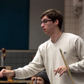 OHIO Music student Peyson Weekley conducting 