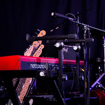 Keyboard, guitars and drums ready for a concert at Ohio University