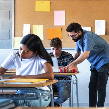 Teacher and student in classroom setting