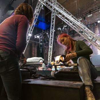 Students work on a production of Hair
