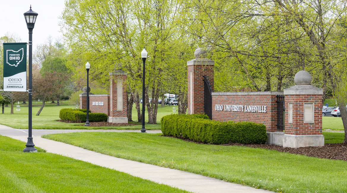 Brick entrance wall with mounted words "Ohio University Zanesville"