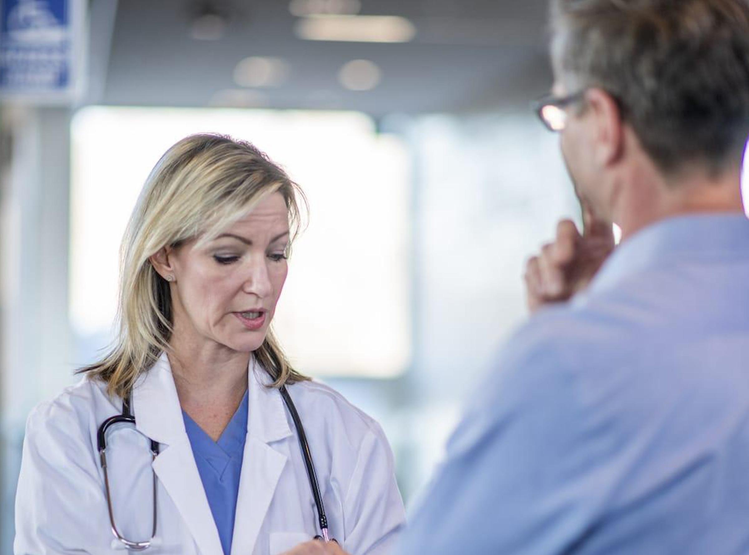 Doctor of nursing practice in a meeting with colleagues