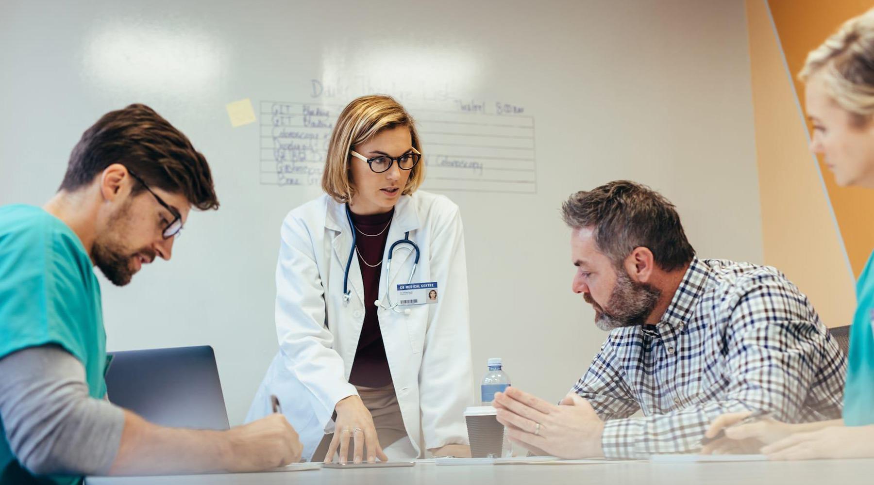 Doctor of nursing practice in a meeting with colleagues