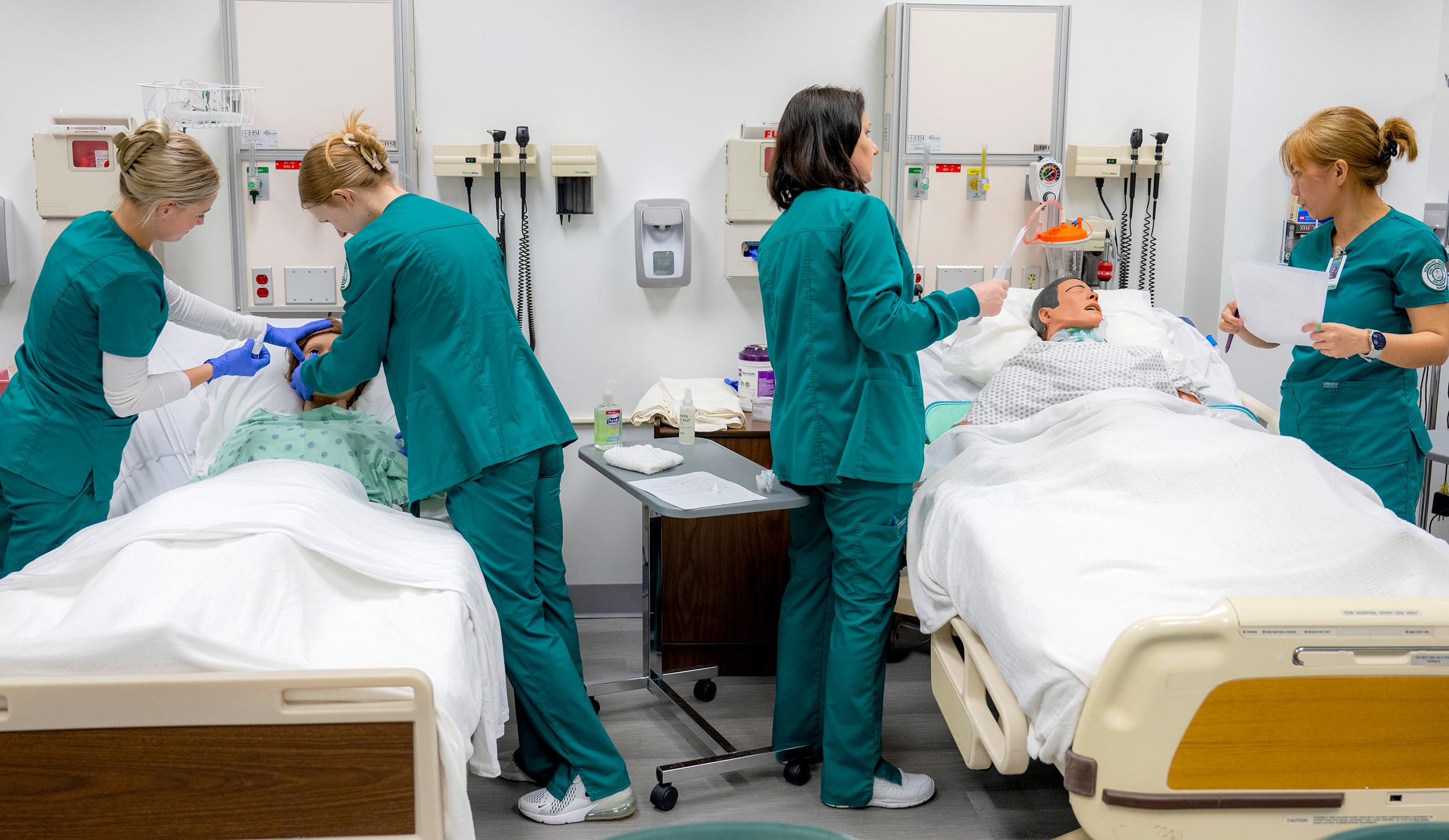 nursing students practice treating patients