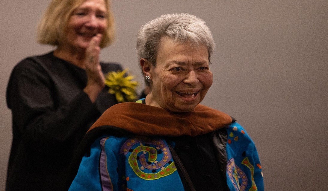 Picture of Dr. Gladys Bailin Stern smiling after receiving her honorary Doctor of Fine Arts