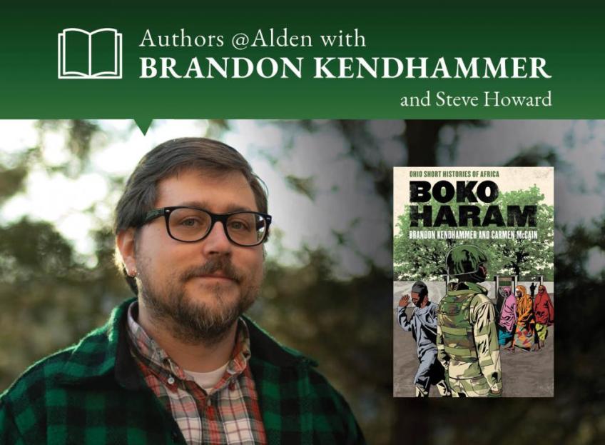 Brandon Kendhammer with his book, Boko Haram