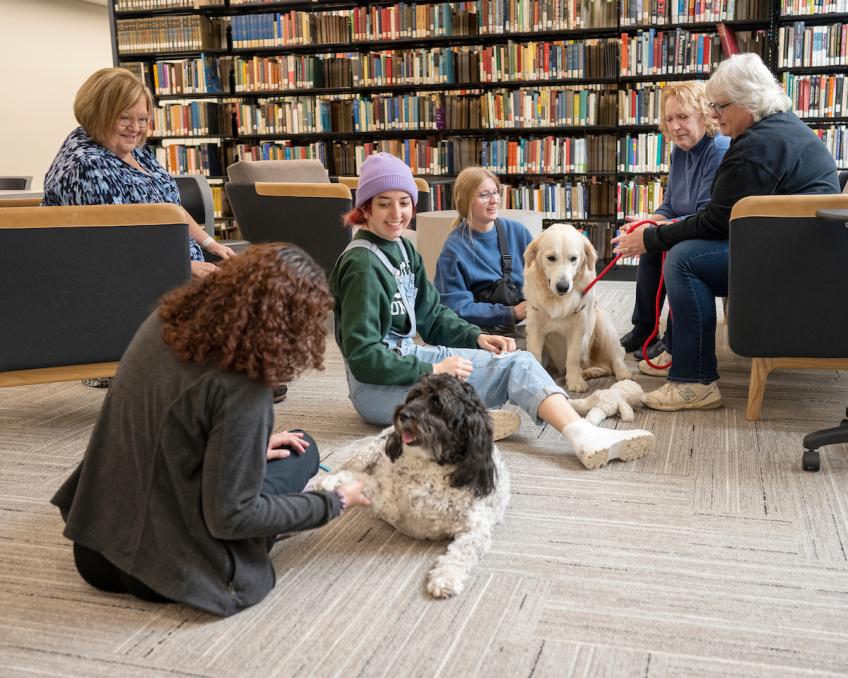 Students visit with therapy dogs at the Zanesville Campus Library