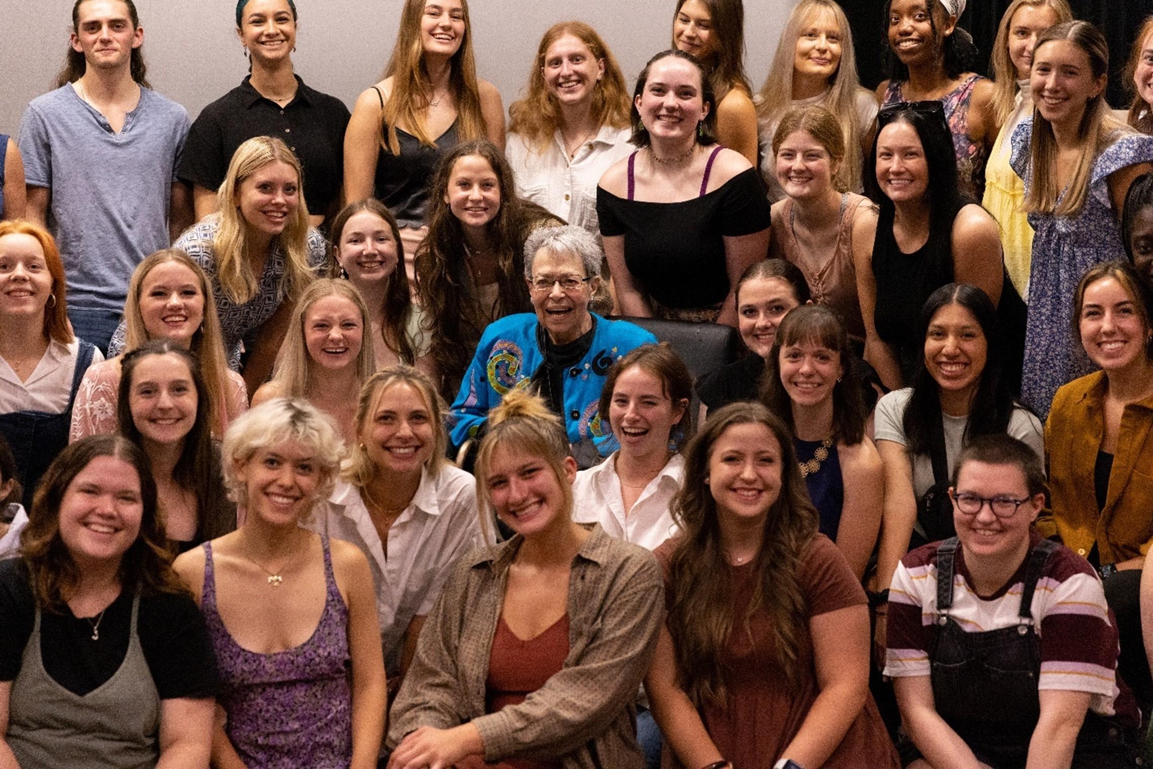 Picture of Gladys Bailin Stern posing with School of Dance Students