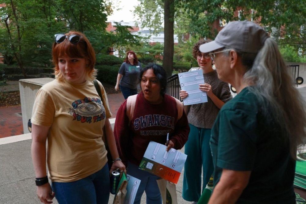 Staff at Camp Alden 2025 preparing students to begin the Scavenger Hunt to find library resources