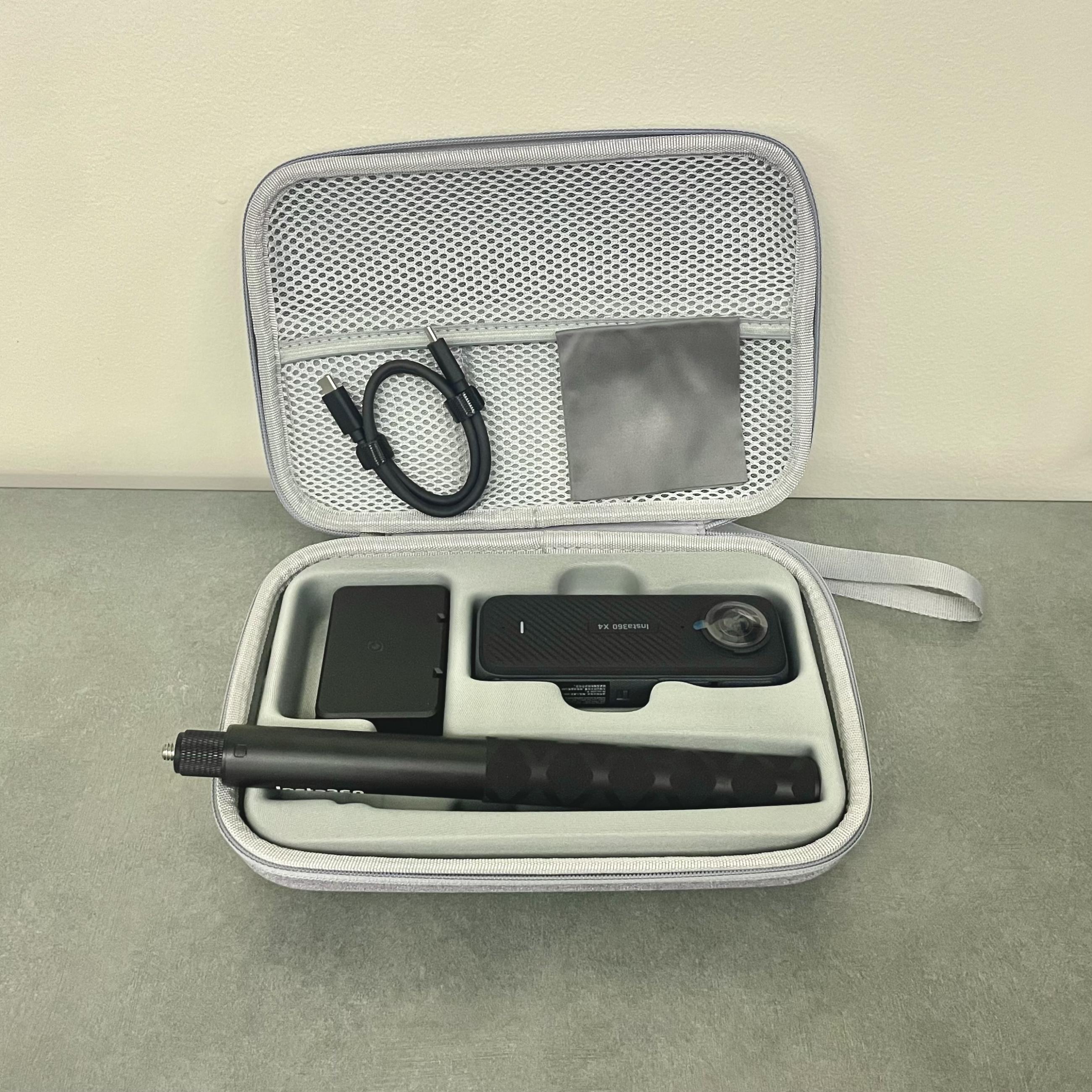 Carrying case containing the Insta360 X4 camera, selfie stick, and accessories