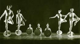 An image from the Nikolais-Louis Collection: a black and white photograph of costumed modern dancers performing