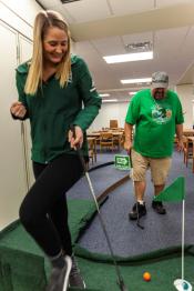 Picture of student winning a course at the Alden Open Mini Golf 