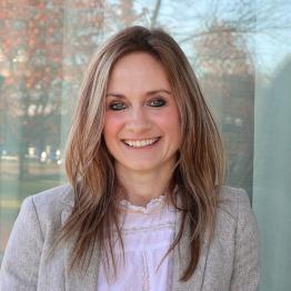 Headshot Portrait of Kate Hoefler smiling