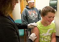 A child receiving an immunization shot.