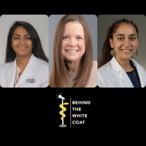 2 students in white coats and a faculty member