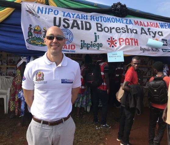 HCOM Graduate Eric Reaves working with CDC