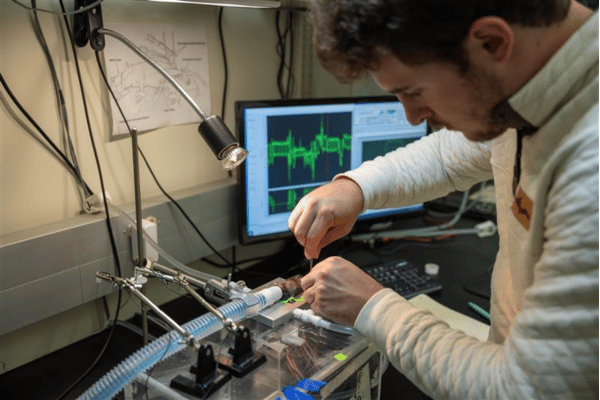 Student doing lab work in research lab