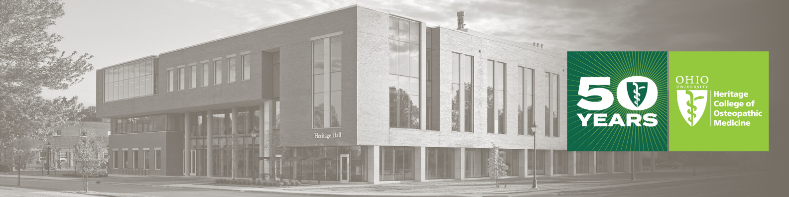 A LinkedIn cover image of Heritage Hall with the Heritage College 50th Anniversary mark overlaid on the right side