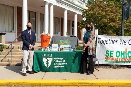 Executive Dean Ken Johnson and Athens Campus Dean Beth Longenecker were onhand to greet and unpack the nearly 50 vehicles that drove through the Athens campus event.