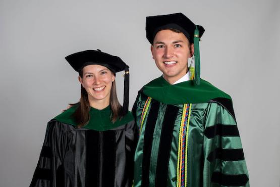 A picture of Ryan Vagedes and his sister Amy in graduation gear