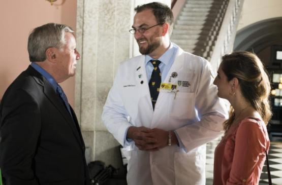 Medical student talks with legislator
