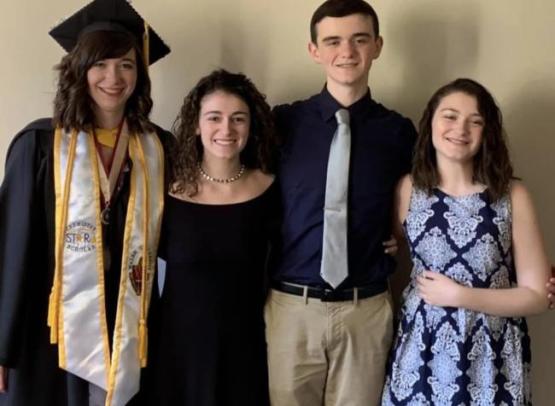 A photo of Emily Cronin (far left) and her family