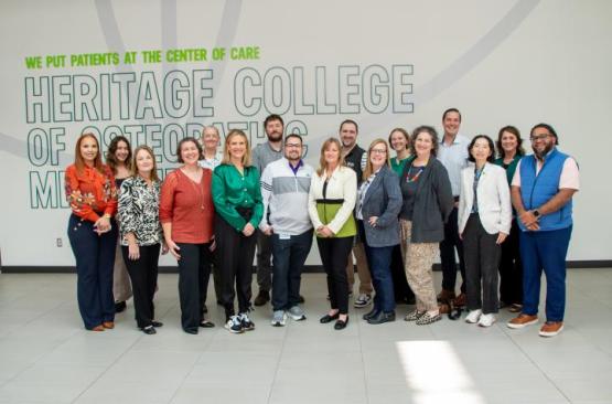 Members of the CARE Leaders cohort post for a group photos