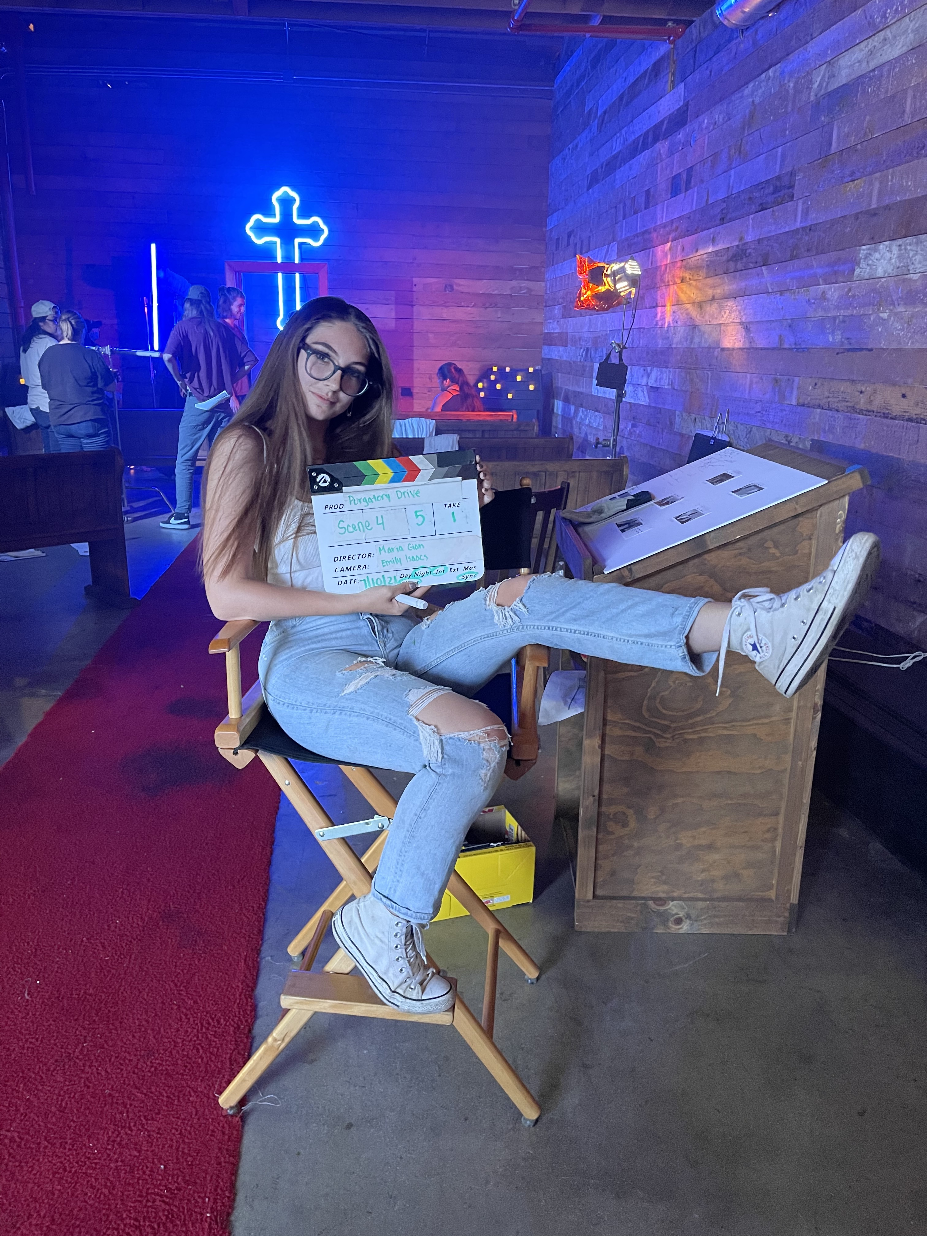 Natalie Artz poses on a film set