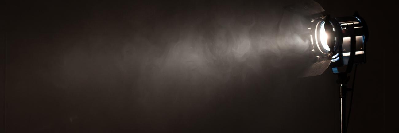 A camera light against a black background