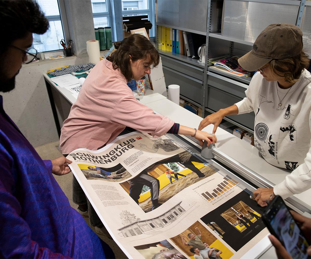 Students work together to create a newspaper.