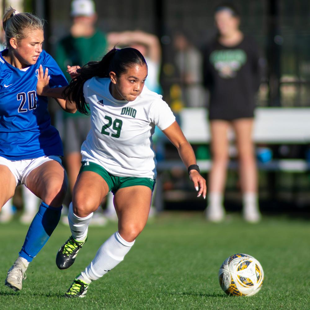 University at Buffalo sophomore Carolyn Hinkle (left) and Ohio University senior Hailey Jeng (right) face off for the ball during a women’s soccer match on Oct. 16, 2025. The Buffalo Bulls beat the Ohio Bobcats 2-1.