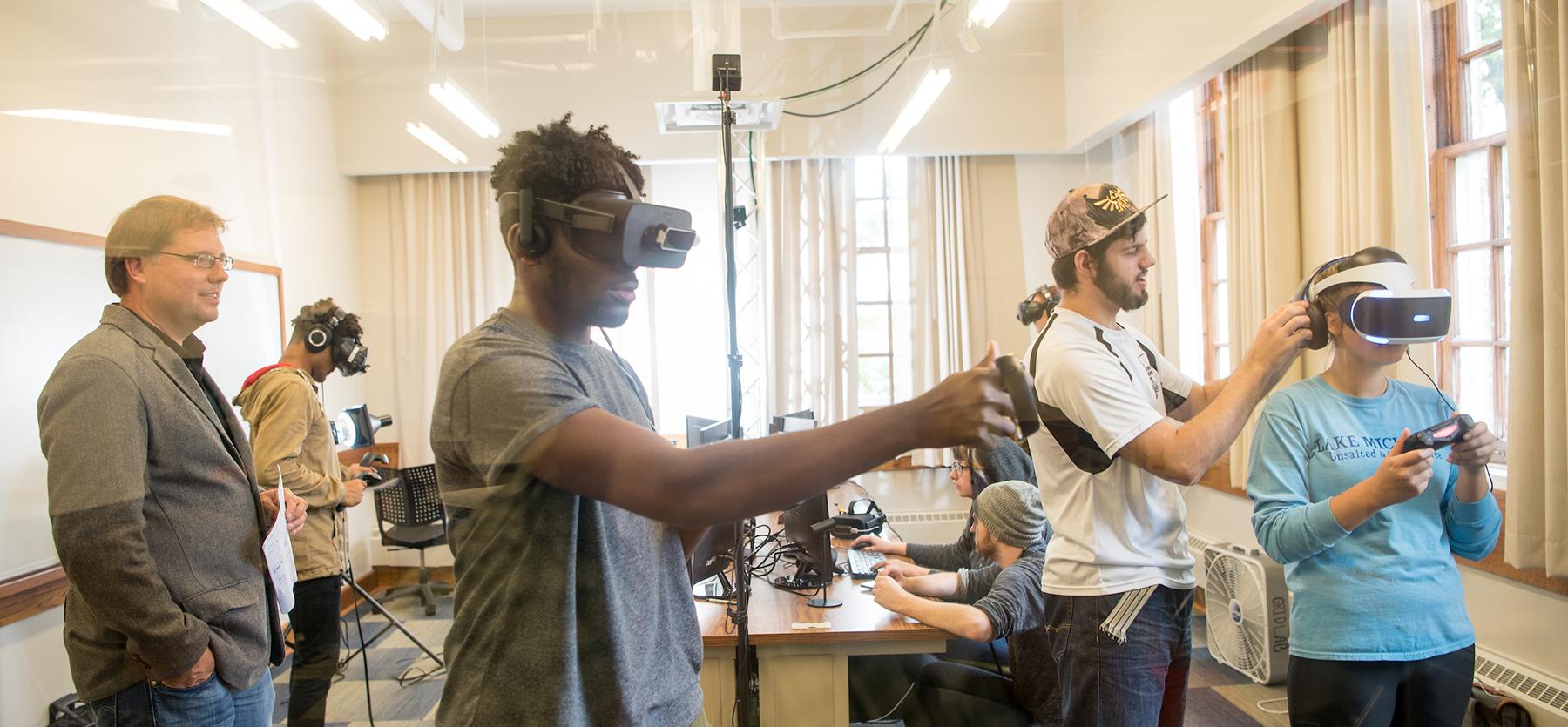 Students play games wearing virtual headsets