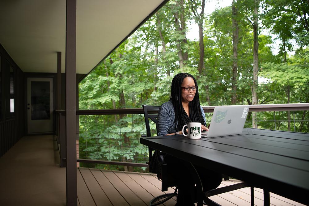 Woman typing on computer