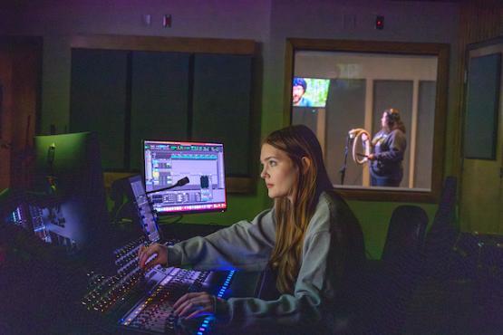 woman working on a videos sound levels