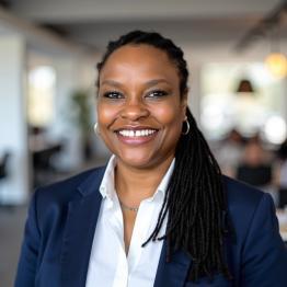 Janice Collins in a newsroom.